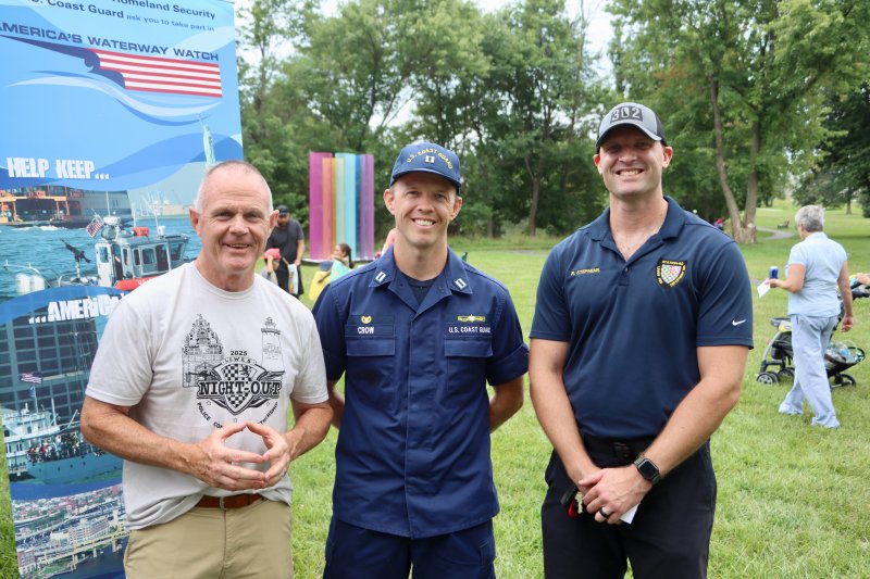 The commanders of three local agencies stop for a photo during Night Out. Shown are (l-r) Chief Tom Spell, Lewes Police Department; John Crow, commanding officer of Coast Guard Marine Safety Unit Lewes; and Robbie Stephens, newly elected Lewes fire chief.
